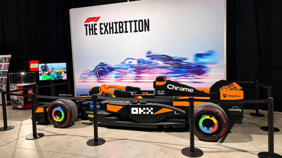 Full size Lego model of a McLaren Formula 1 car in front of the F1 The Exhibition backdrop